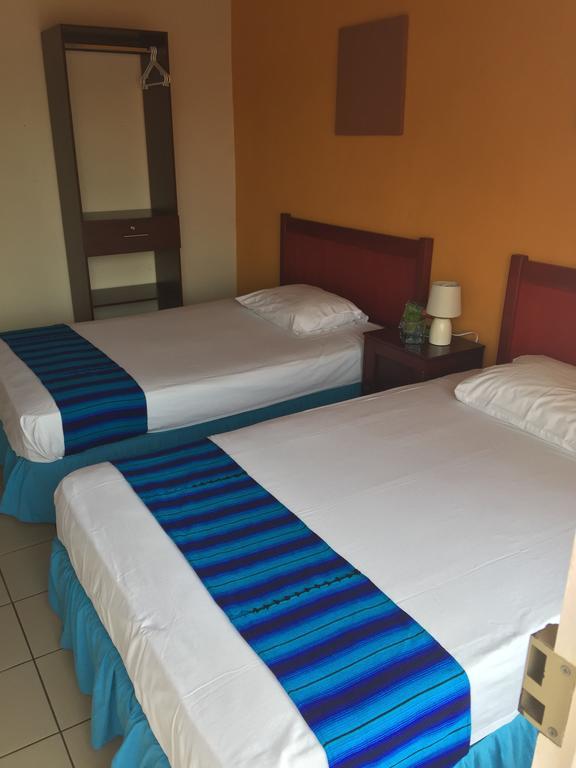 Hotel Villa Margarita Flores Oda fotoğraf