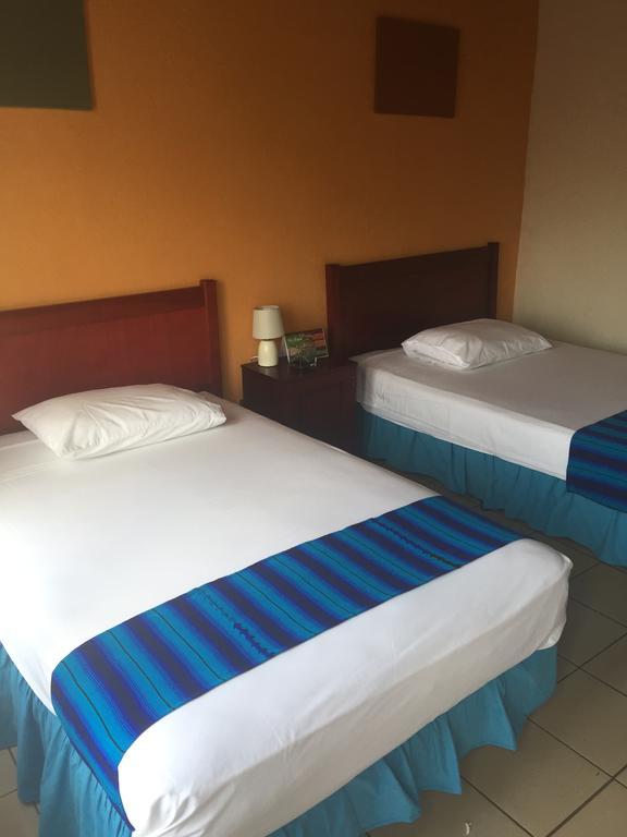 Hotel Villa Margarita Flores Oda fotoğraf