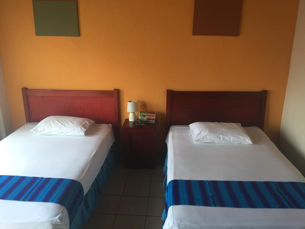 Hotel Villa Margarita Flores Oda fotoğraf