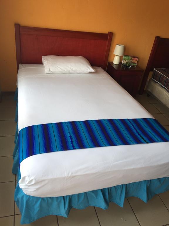 Hotel Villa Margarita Flores Oda fotoğraf