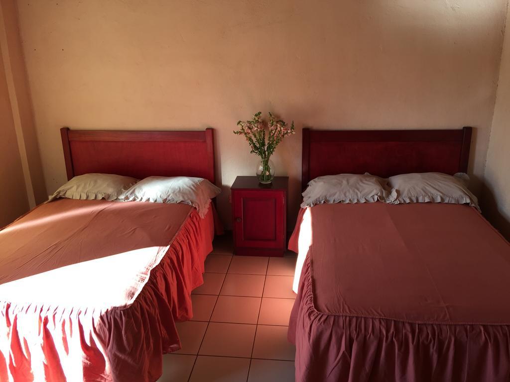 Hotel Villa Margarita Flores Oda fotoğraf