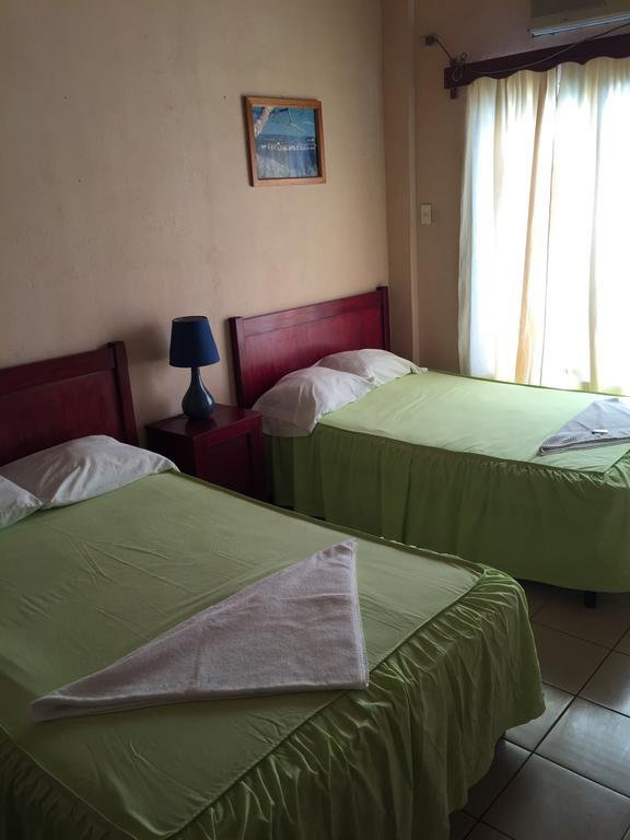 Hotel Villa Margarita Flores Oda fotoğraf