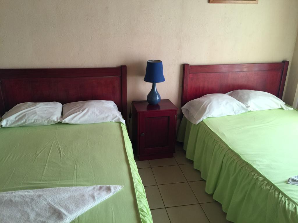 Hotel Villa Margarita Flores Oda fotoğraf